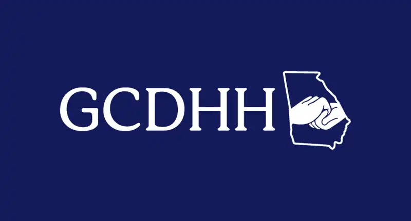 Blue background with white GCDHH logo, showing the state of GA and two joined hands in solidarity.